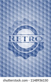 Retro blue emblem with geometric pattern.