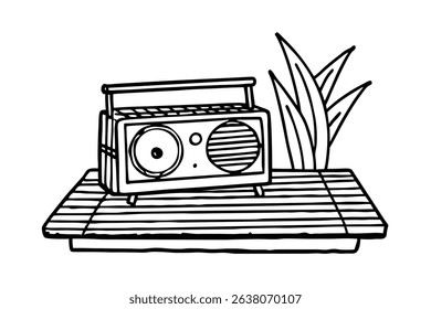 Retro boombox line drawing on wooden surface with plants
