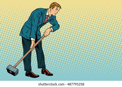 Retro businessman with a big hammer, copy space right, pop art vector illustration