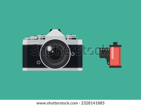 Retro camera with film roll in a flat style. Vector illustration
