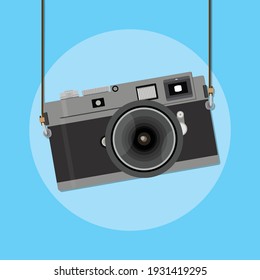Retro camera in a flat style blue background. Old camera with strap. Vector 