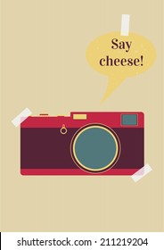 retro camera with say cheese text on background