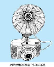 Retro camera. Stylized camera. Line art. Black and white drawing by hand. Graphic arts. Doodle. Tattoo.