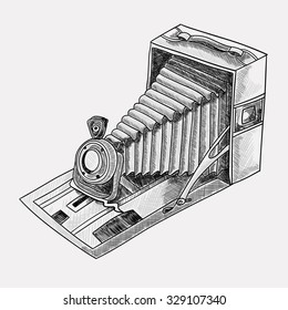 Retro camera. Vector sketch illustration