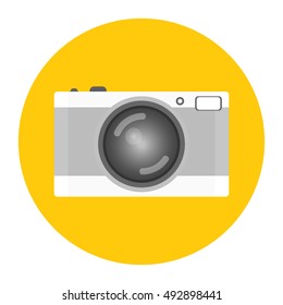 Retro camera or vintage camera in a flat style on a colored background. 