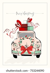 Retro car with gift boxes. Text Merry Christmas.