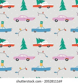 Retro cars on light background. Christmas concept. Seamless pattern. Background for wallpaper, textile, postcards, wrapping etc. 