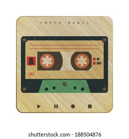 retro cassette tape icon on wooden background