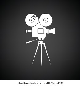 Retro cinema camera icon. Black background with white. Vector illustration.