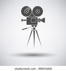 Retro cinema camera icon on gray background with round shadow. Vector illustration.