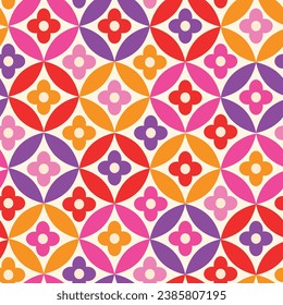 Retro Colorful flowers on mid century circles seamless pattern in pink, purple, orange and red on white background. For home decor, textile and retro backgrounds.