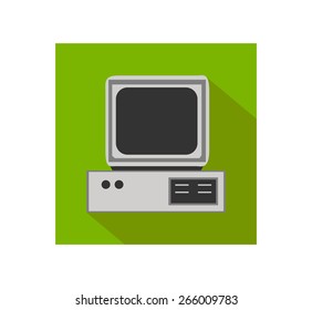 Retro computer flat icon with shadow and green background.