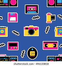 Retro devices seamless pattern. Memphis design. 80s - 90s fashion style. Record player, videotape, audiocassette, photo camera, floppy disk