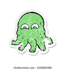 retro distressed sticker of a cartoon alien squid face