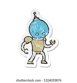 retro distressed sticker of a cartoon alien robot