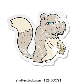 retro distressed sticker of a cartoon angry squirrel with nut