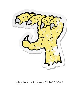 retro distressed sticker of a cartoon bird claw