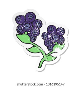 retro distressed sticker of a cartoon blueberries