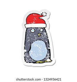 retro distressed sticker of a cartoon christmas penguin