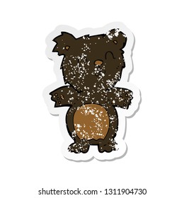 retro distressed sticker of a cartoon cute black bear cub