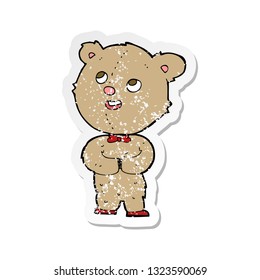 retro distressed sticker of a cartoon cute teddy bear