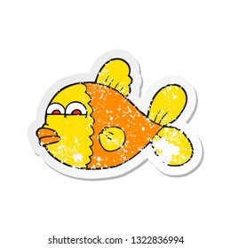 retro distressed sticker of a cartoon fish