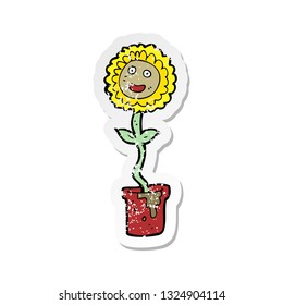 retro distressed sticker of a cartoon flower with face