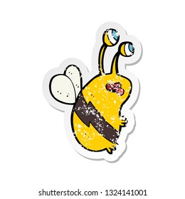 retro distressed sticker of a cartoon funny bee