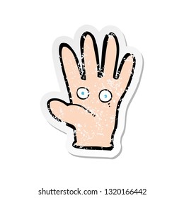 retro distressed sticker of a cartoon hand with eyes
