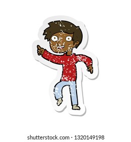 retro distressed sticker of a cartoon happy boy pointing