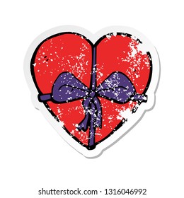 retro distressed sticker of a cartoon heart shaped present