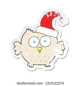 retro distressed sticker of a cartoon little owl wearing christmas hat