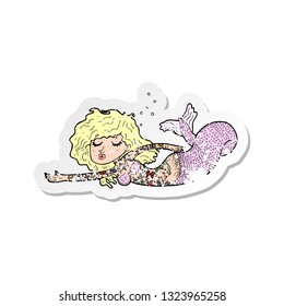 retro distressed sticker of a cartoon mermaid covered in tattoos