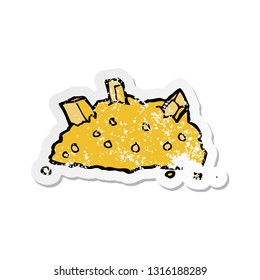 retro distressed sticker of a cartoon pile of gold