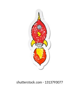 retro distressed sticker of a cartoon spaceship