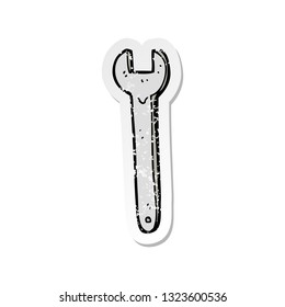 retro distressed sticker of a cartoon spanner