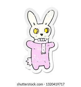 retro distressed sticker of a cartoon spooky skull rabbit