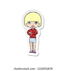 retro distressed sticker of a cartoon woman with folded arms