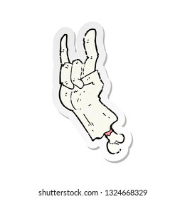 retro distressed sticker of a cartoon zombie hand making rock symbol