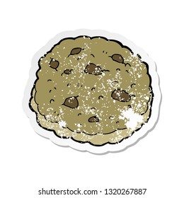 retro distressed sticker of a chocolate chip cookie cartoon