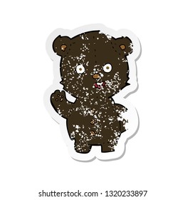 retro distressed sticker of a cute cartoon black bear