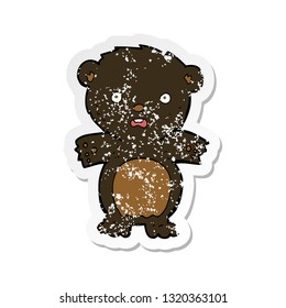 retro distressed sticker of a frightened black bear cartoon