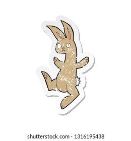 retro distressed sticker of a funny cartoon rabbit
