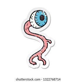 retro distressed sticker of a gross cartoon eyeball