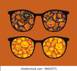 Retro eyeglasses with halloween reflection in it. Vector illustration of accessory -  isolated sunglasses.