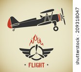 Retro flat looking plane and emblem with wings, flame and propeller