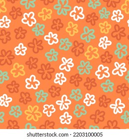 Patrón retro de repetición sin fisuras florales. Flores simples vectoriales colocadas aleatoriamente sobre la superficie impresa sobre el fondo naranja.