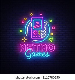 Retro Games Vector Logo. Retro geek gaming gamepad in hand neon sign, modern trend design, vivid vector illustration, promotional character games, Vintage sign. Vector Illustration