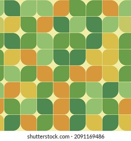 Retro geometric  leaves seamless  pattern  70s style in green , orange and yellow. Great for wallpaper, home décor, textile and wrapping paper 