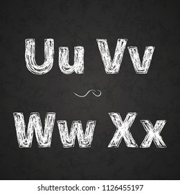 Retro hand drawn alphabet letters drawing with white chalk on black chalkboard, vintage U, V, W, X letters